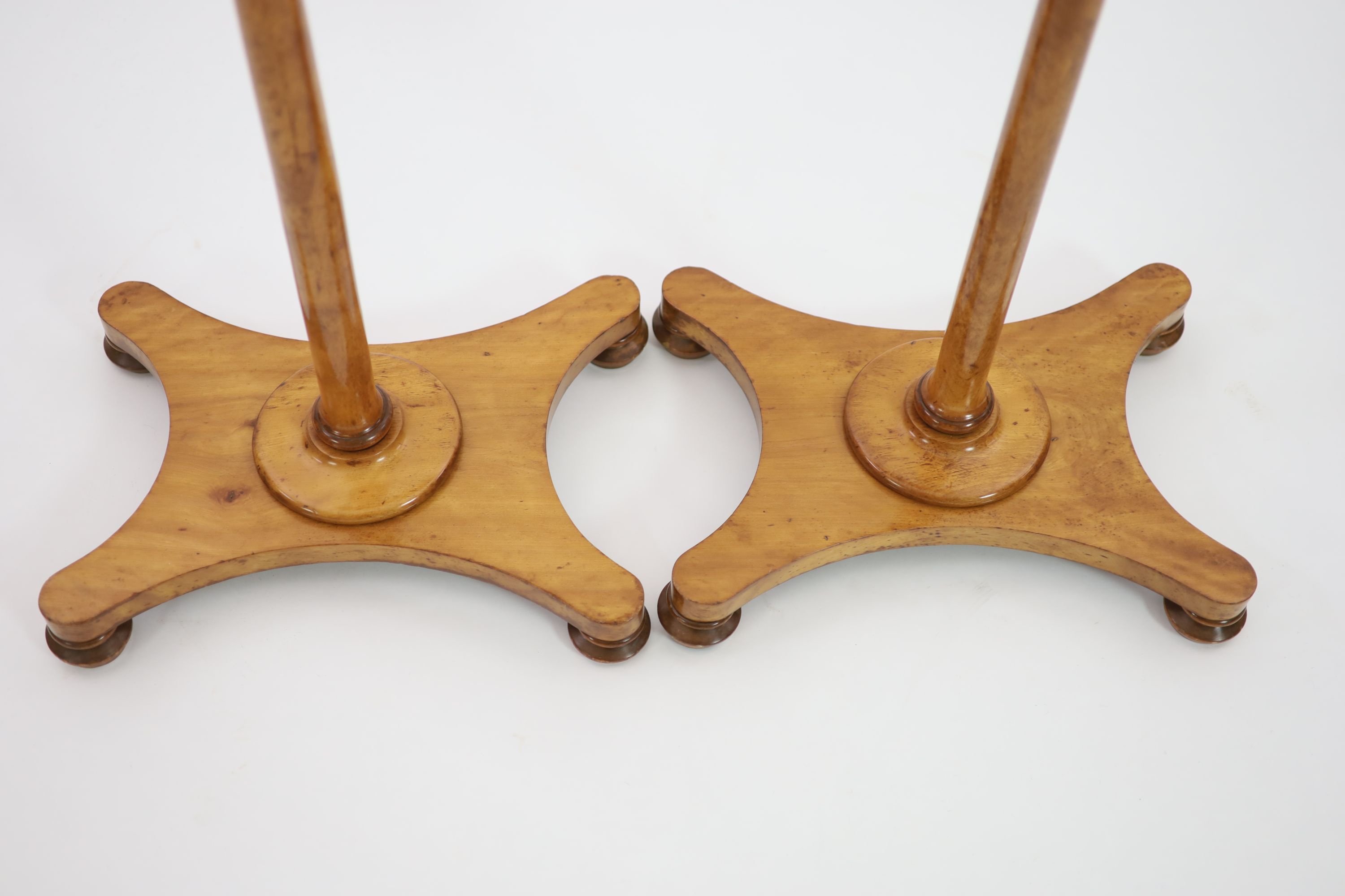 A pair of early Victorian satinwood flower stands, W.38cm D.28cm H.107cm